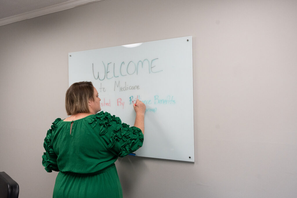 Tracey writing on the white board